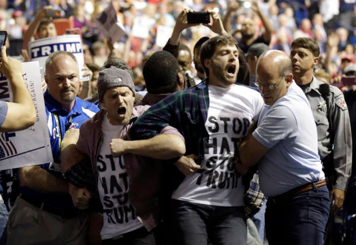 Protesters at Donald Trump rally (AP Photo/Gerry Broome)