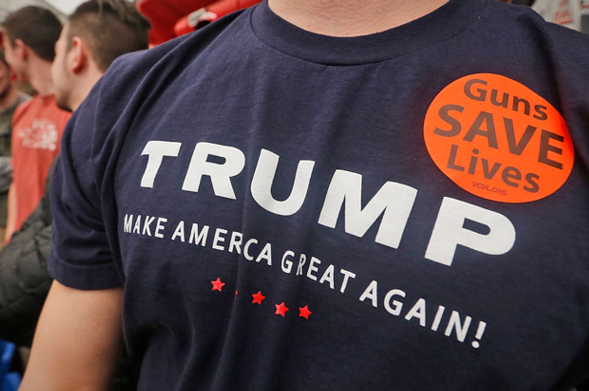 A supporter of Republican presidential candidate, Donald Trump wears a sticker and a Trump t-shirt during a rally at Radford University in Radford, Va., Monday, Feb. 29, 2016. (AP Photo/Steve Helber) (AP/Steve Helber)