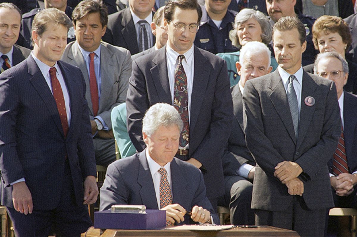 Bill Clinton signs the $30 billion crime bill, Sept. 13, 1994.   (AP/Dennis Cook)