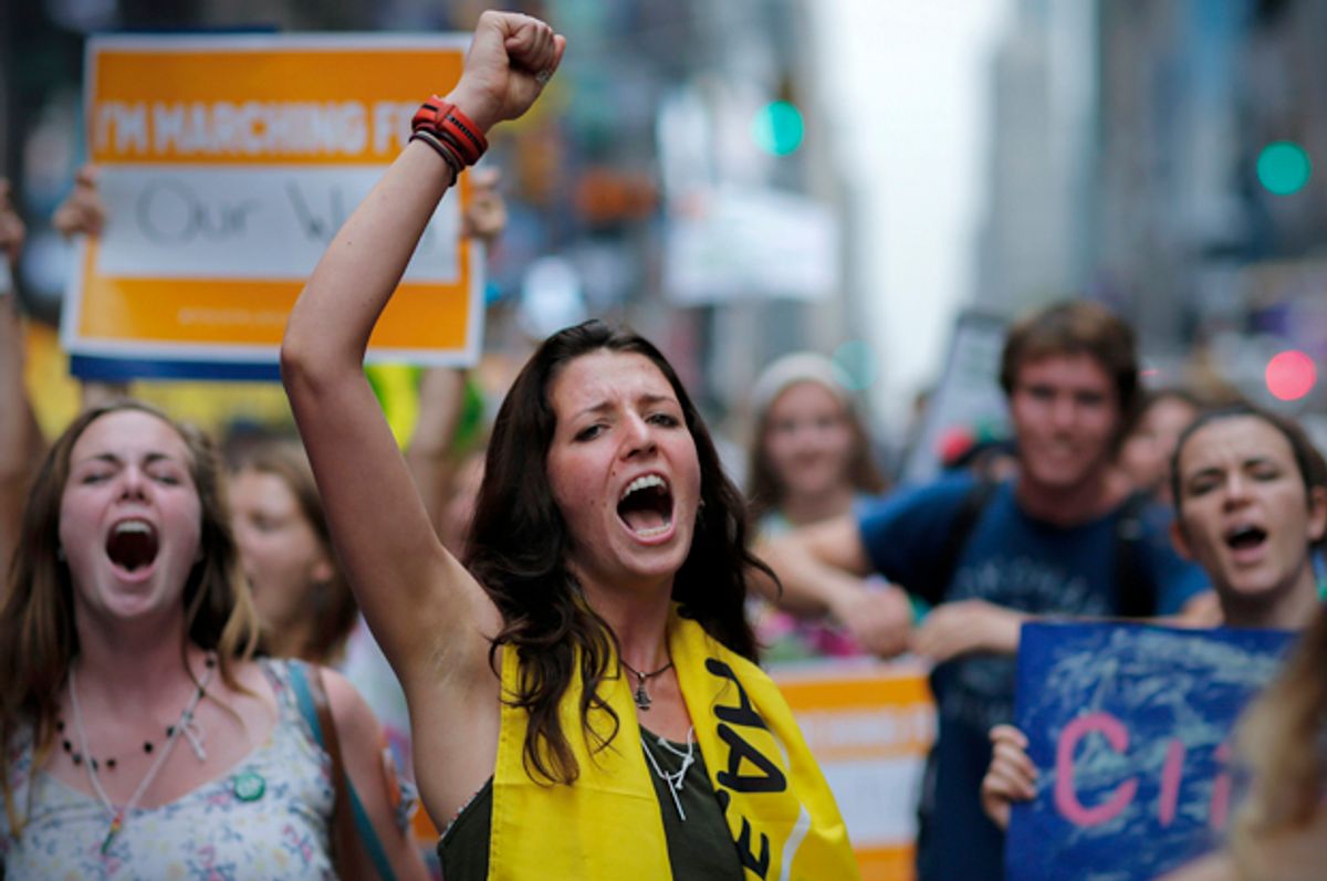 Protesters in Times Square against climate change in New York, September 21, 2014.    (Reuters/Eduardo Munoz)