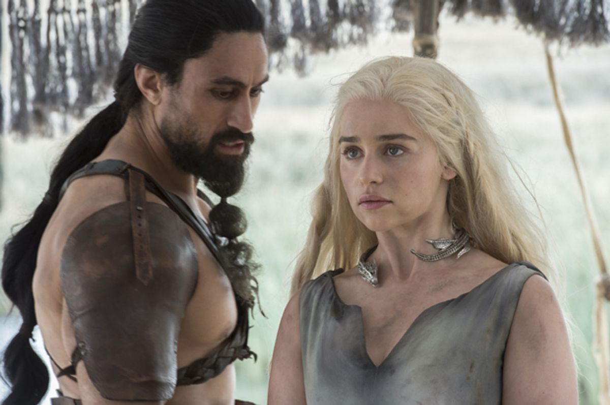 Joe Naufahu and Emilia Clarke in "Game of Thrones"   (HBO)