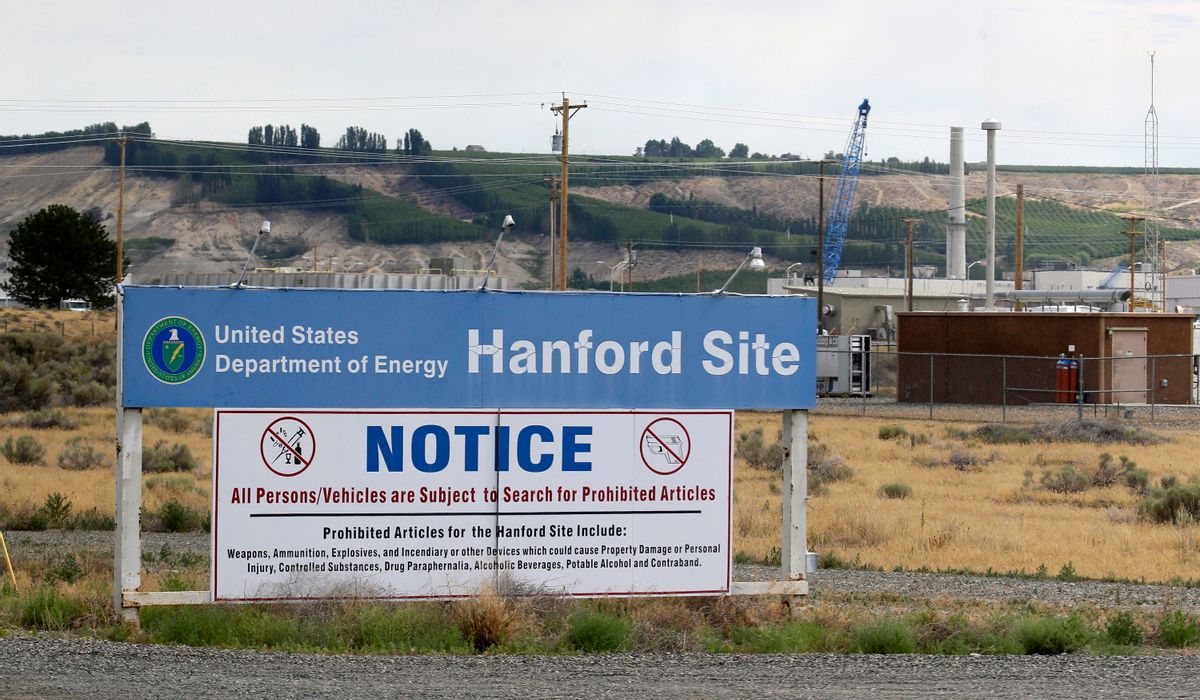 FILE - In this July 9, 2014, file photo, a sign informs visitors of prohibited items on the Hanford Nuclear Reservation near Richland, Wash. Officials for the Hanford Nuclear Reservation are trying to determine if a second giant underground tank containing radioactive waste from the production of plutonium for nuclear weapons is leaking, the U.S. Department of Energy revealed. (AP Photo/Ted S. Warren, File) (AP)