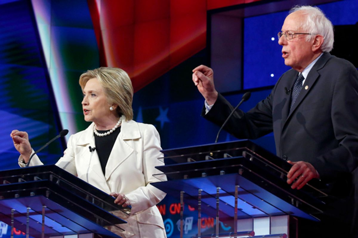 Hillary Clinton and Senator Bernie Sanders speak simultaneously during a Democratic debate, April 14, 2016.    (Reuters/Lucas Jackson)