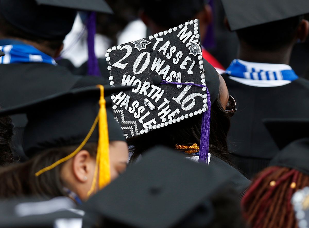 A student's personal message is conveyed on her cap during the undergraduate graduation exercises for Jackson State University's Class of 2016 at the Mississippi Veterans Memorial Stadium in Jackson, Miss., Saturday, April 23, 2016. First lady Michelle Obama delivered the commencement address. (AP Photo/Rogelio V. Solis) (AP)