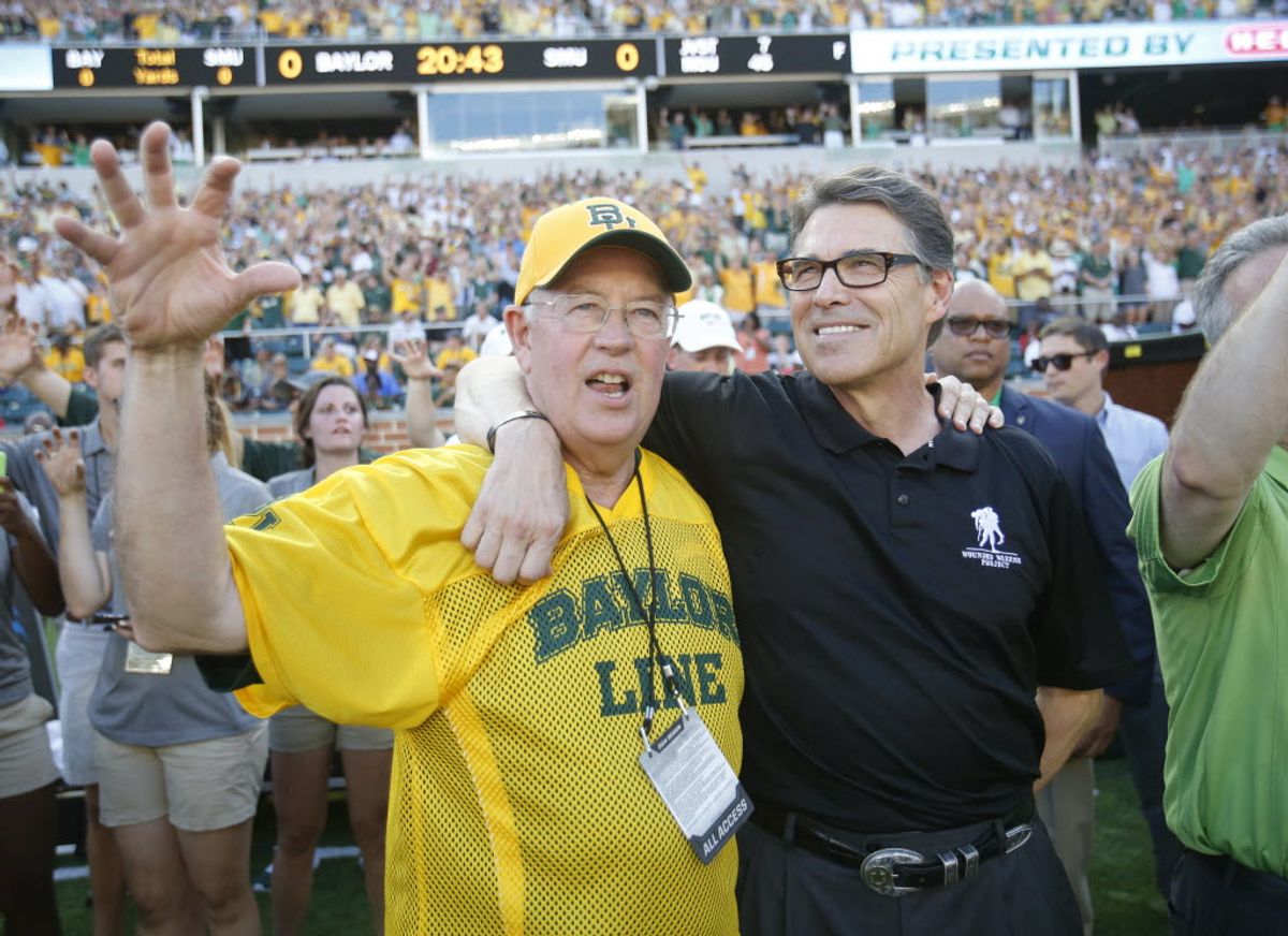 Baylor Bears president Ken Starr and Texas Governor Rick Perry prior to the start of the inaugural game between Baylor University and Southern Methodist University at McLane Stadium in Waco on Sunday, August 31, 2014.  (Vernon Bryant/The Dallas Morning News)