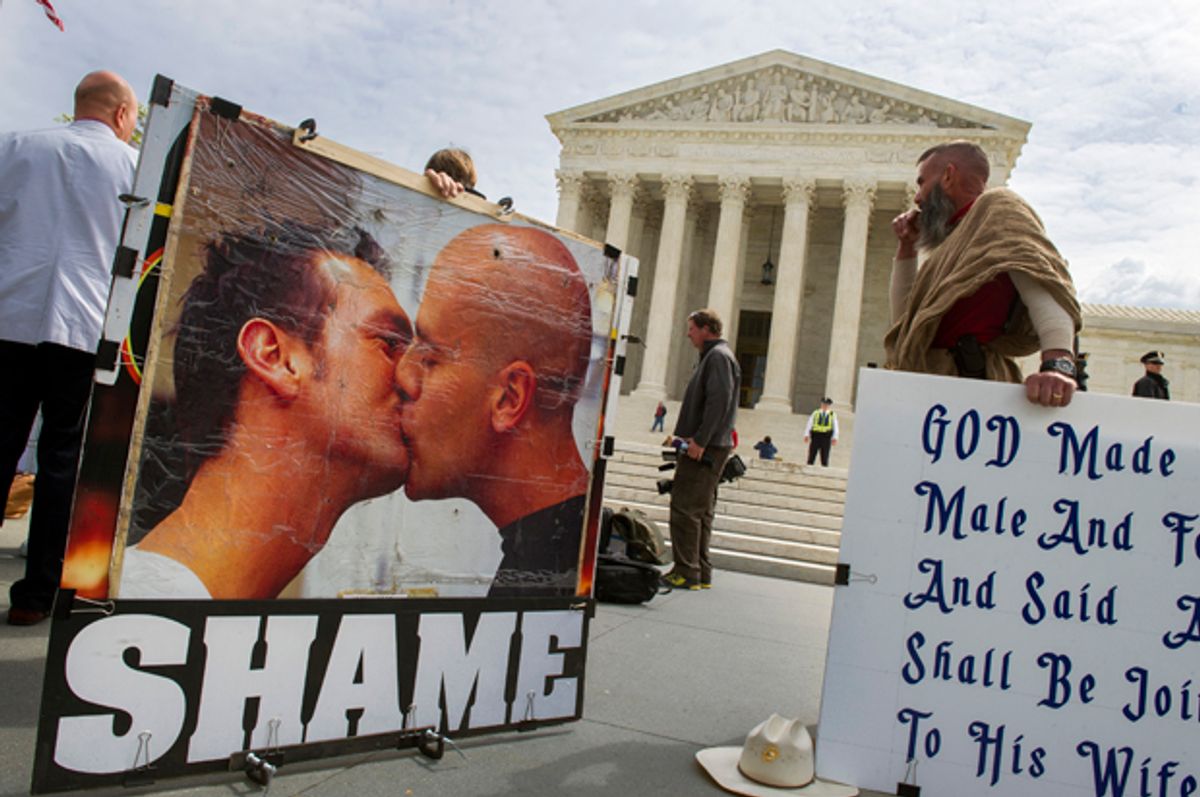 Anti-gay marriage protestors demonstrate in front of the Supreme Court, April 27, 2015.    (AP/Cliff Owen)