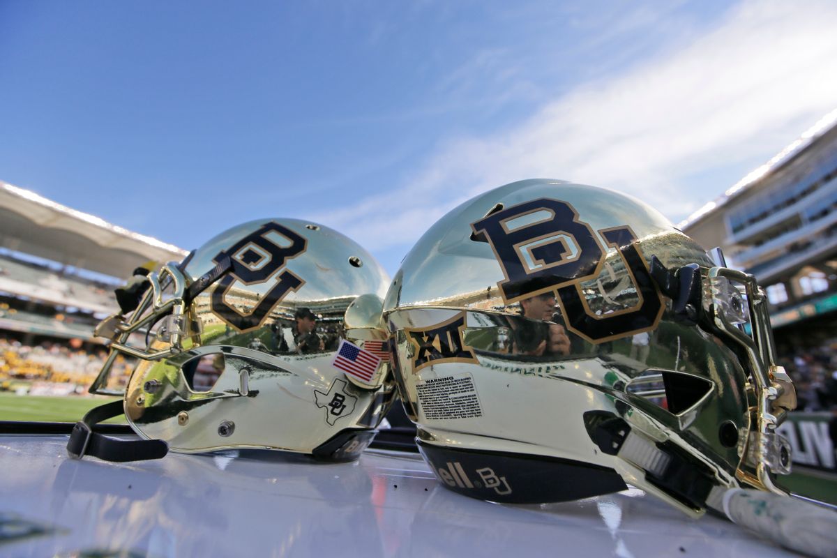 FILE - In this Dec. 5, 2015, file photo, Baylor helmets on shown the field after an NCAA college football game in Waco, Texas. Baylor University will look to rebuild its reputation and perhaps its football program after an outside review found administrators mishandled allegations of sexual assault and the team operated under the perception it was above the rules. (AP Photo/LM Otero, File) (AP Photo/LM Otero, File)