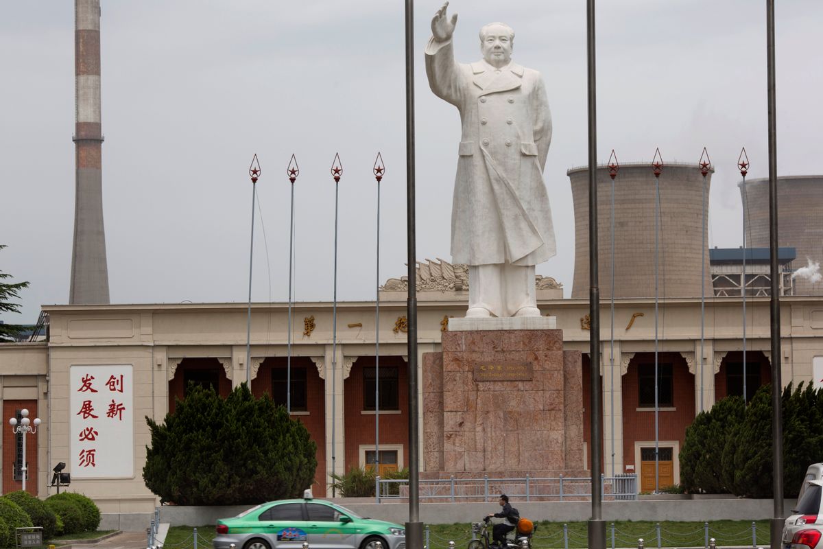 In this photo taken Monday, May 2, 2016, an enormous statue of Mao Zedong looms over the No. 1 Tractor Factory in Luoyang in central China's Henan province. Fifty years after Mao unleashed the decade-long Cultural Revolution to reassert his authority and revive his radical communist agenda, the spirit of modern China's founder still exerts a powerful pull. Millions of people were persecuted, publicly humiliated, beaten or killed during the upheaval, as zealous factionalism metastasized countrywide, tearing apart Chinese society at a most basic level. () (AP Photo/Ng Han Guan)