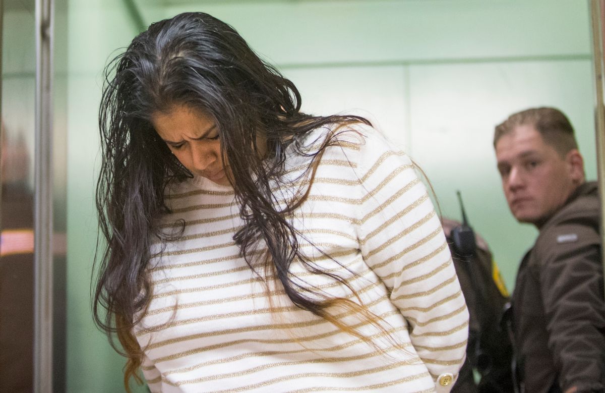 FILE - In this March 30, 2015 file photo, Purvi Patel is taken into custody after being sentenced to 20 years in prison for feticide and neglect of a dependent on at the St. Joseph County Courthouse in South Bend, Ind. Attorneys for Patel will urge the Indiana Court of Appeals on Monday, May 23, 2016 to reverse her 2015 convictions on charges of feticide and neglect of a dependent resulting in death. The state's attorney general's office will defend the northern Indiana jury's decision. (Robert Franklin/South Bend Tribune via AP) MANDATORY CREDIT (AP)