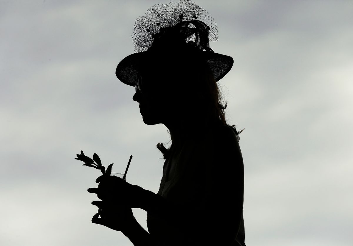 A fan wears a hat before the 142nd running of the Kentucky Derby horse race at Churchill Downs Saturday, May 7, 2016, in Louisville, Ky. (AP Photo/David J. Phillip) (AP Photo/David J. Phillip)