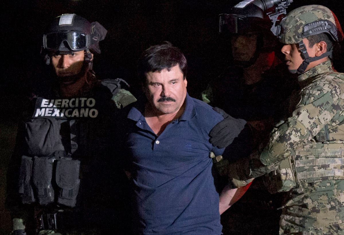 FILE - In this Jan. 8, 2016 file photo, Mexican drug lord Joaquin "El Chapo" Guzman is escorted by army soldiers  to a waiting helicopter, at a federal hangar in Mexico City, after he was recaptured from breaking out of a maximum security prison in Mexico. The History channel says it's developing a drama series focusing on Guzman's story. Last year, Guzman had broken out of prison and was on the run when he had a secret meeting with Mexican actress Kate del Castillo and Sean Penn. The actor wrote about it for Rolling Stone. (AP Photo/Rebecca Blackwell, File) (AP Photo/Rebecca Blackwell, File)