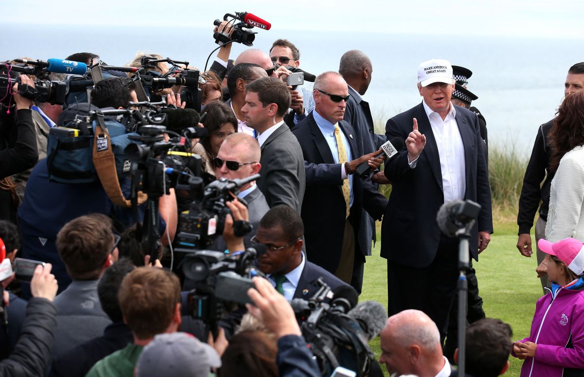 US presidential candidate Donald Trump, right, chats with the watching media whilst on a tour of the Trump International Golf Links at Balmedie, near Aberdeen, Scotland, Saturday June 25, 2016.  Presidential hopeful Donald Trump is on a short break away from his presidential campaign. (Andrew Milligan / PA via AP) UNITED KINGDOM OUT - NO SALES - NO ARCHIVES (AP)