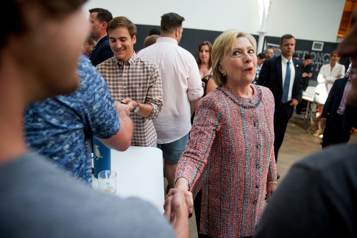 Democratic presidential candidate Hillary Clinton greets workers at Galvanize, a work space for technology companies, in Denver, Tuesday, June 28, 2016. (AP Photo/Andrew Harnik) (AP Photo/Andrew Harnik)