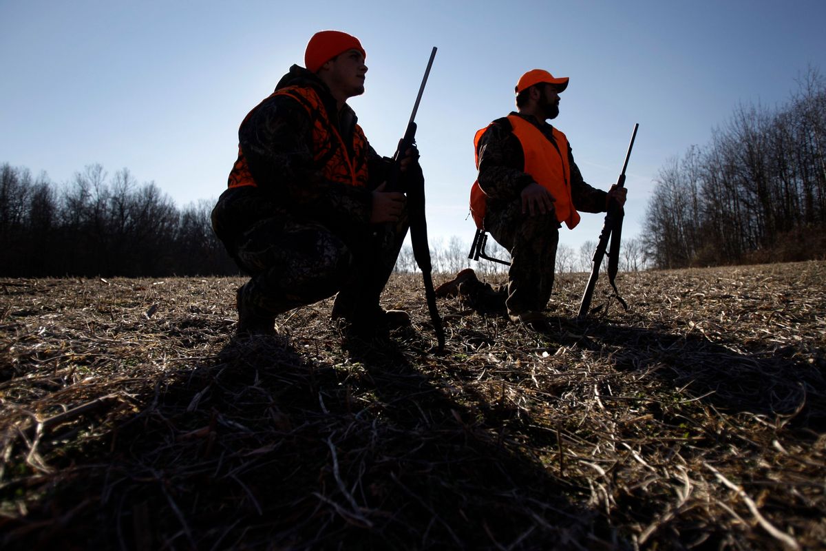 FILE - In this Wednesday, Dec. 3, 2008 file photo, Delta Theta Sigma fraternity brothers hunt for deer together on Penn State University farm land in State College, Pa. The Delta Theta Sigma fraternity is geared toward students interested in agriculture careers, many of them avid hunters from growing up in small towns and rural areas. (AP Photo/Carolyn Kaster) (AP)