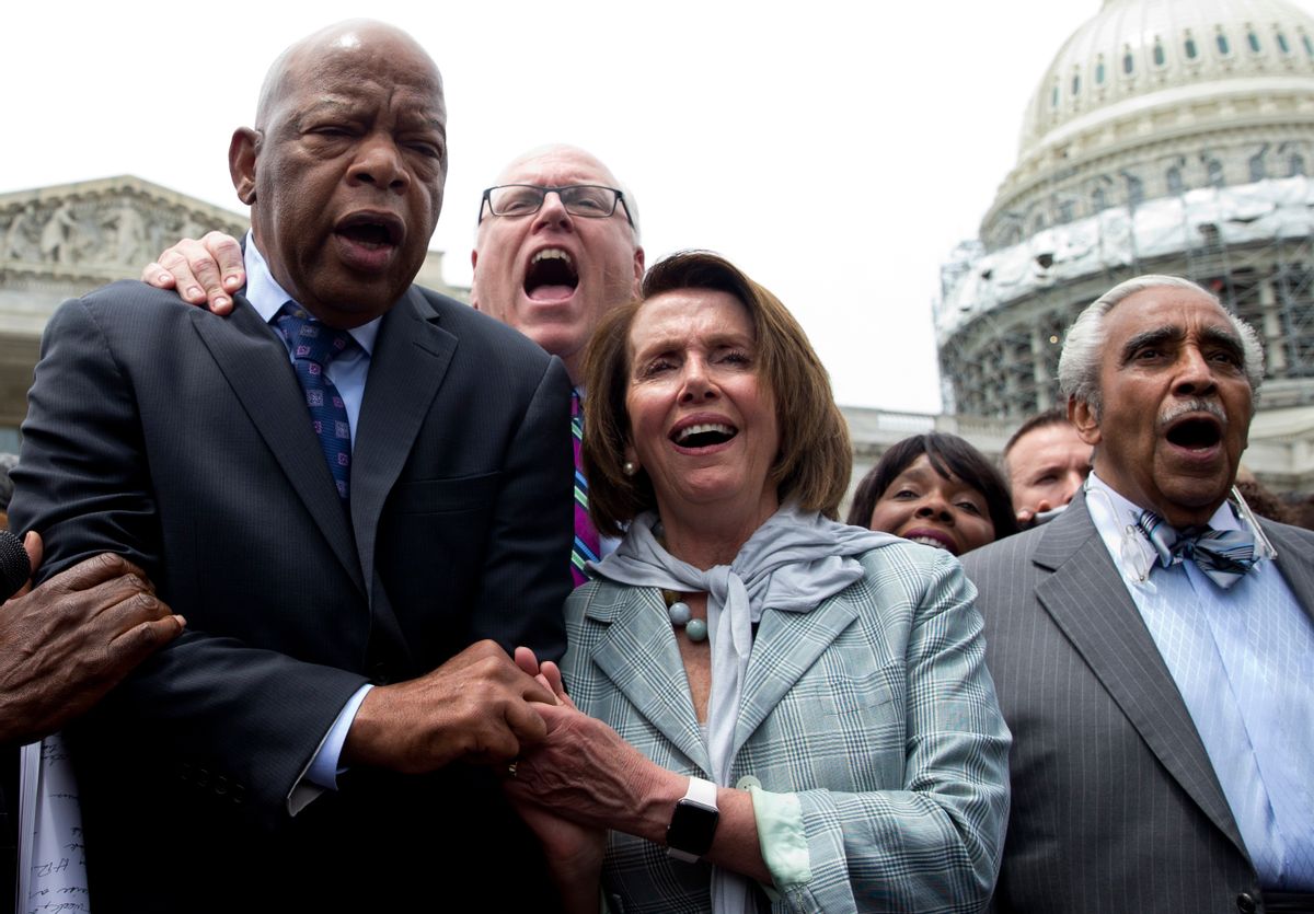 From left, Rep. John Lewis, D-Ga., Rep. Joseph Crowley, D-N.Y., House Minority Leader Nancy Pelosi of Calif. and Rep. Charles Rangel, D-N.Y., sing "We Shall Overcome" on Capitol Hill in Washington, Thursday, June 23, 2016, after House Democrats ended their sit-in protest. (AP Photo/Carolyn Kaster) (AP)
