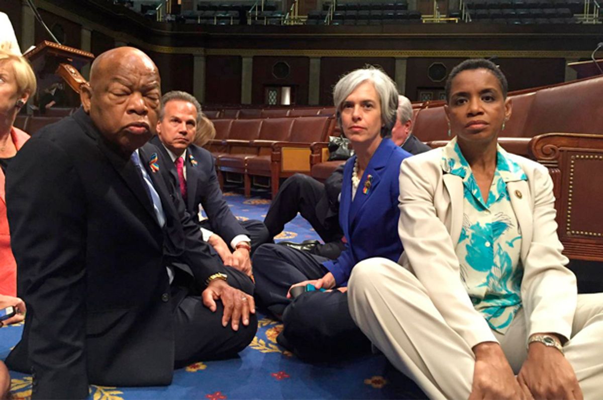 A photo tweeted from the House by Rep. Donna Edwards shows Democratic members staging a sit-in "to demand action on common sense gun legislation," June 22, 2016.    (Reuters/U.S. Rep. Donna Edwards)