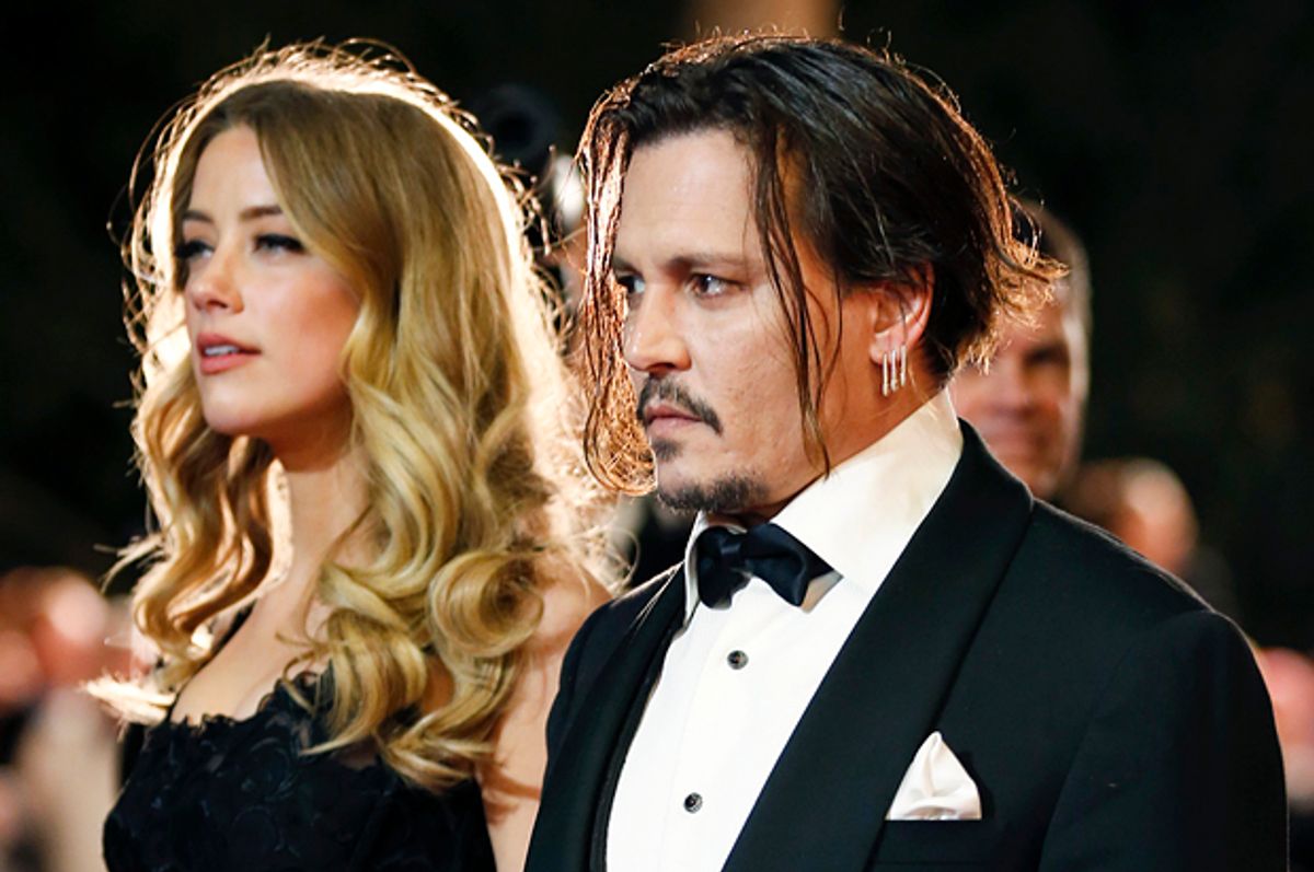 Amber Heard, Johnny Depp   (Reuters/Danny Moloshok)