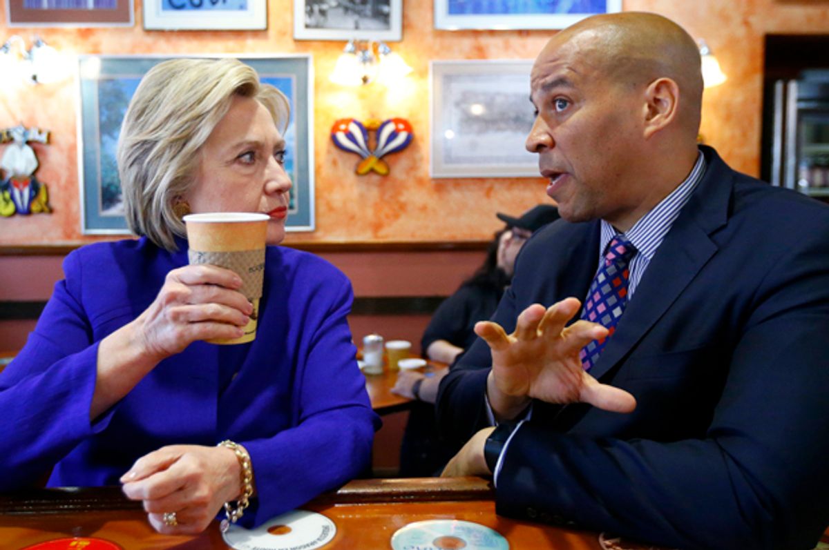Hillary Clinton talks with Cory Booker at Omar's Cafe in Newark, NJ, June 1, 2016.   (AP/Julio Cortez)