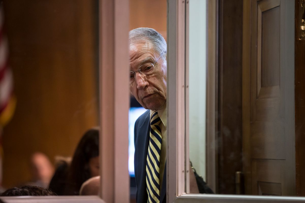 Senate Judiciary Committee Chairman Sen. Charles Grassley, R-Iowa, closes the door to a room where Homeland Security Secretary Jeh Johnson was monitoring reports of an active shooter at Joint Base Andrews, Md., prior to an appearance before the committee, Thursday, June 30, 2016, on Capitol Hill in Washington. (AP Photo/J. Scott Applewhite) (AP)