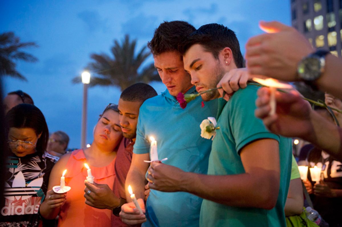 A candlelight vigil for the victims of a mass shooting at the Pulse nightclub, June 13, 2016, in Orlando, Fla.    (AP/David Goldman)