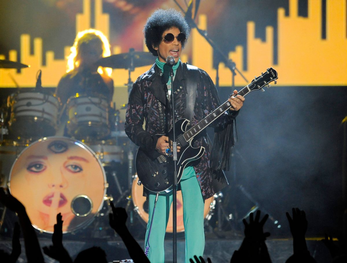 FILE - In this May 19, 2013 file photo, Prince performs at the Billboard Music Awards at the MGM Grand Garden Arena in Las Vegas. A law-enforcement official says that tests show the music superstar died of an opioid overdose. Prince was found dead at his home on April 21, 2016, in suburban Minneapolis. He was 57.  (Photo by Chris Pizzello/Invision/AP, File) (Chris Pizzello/invision/ap)