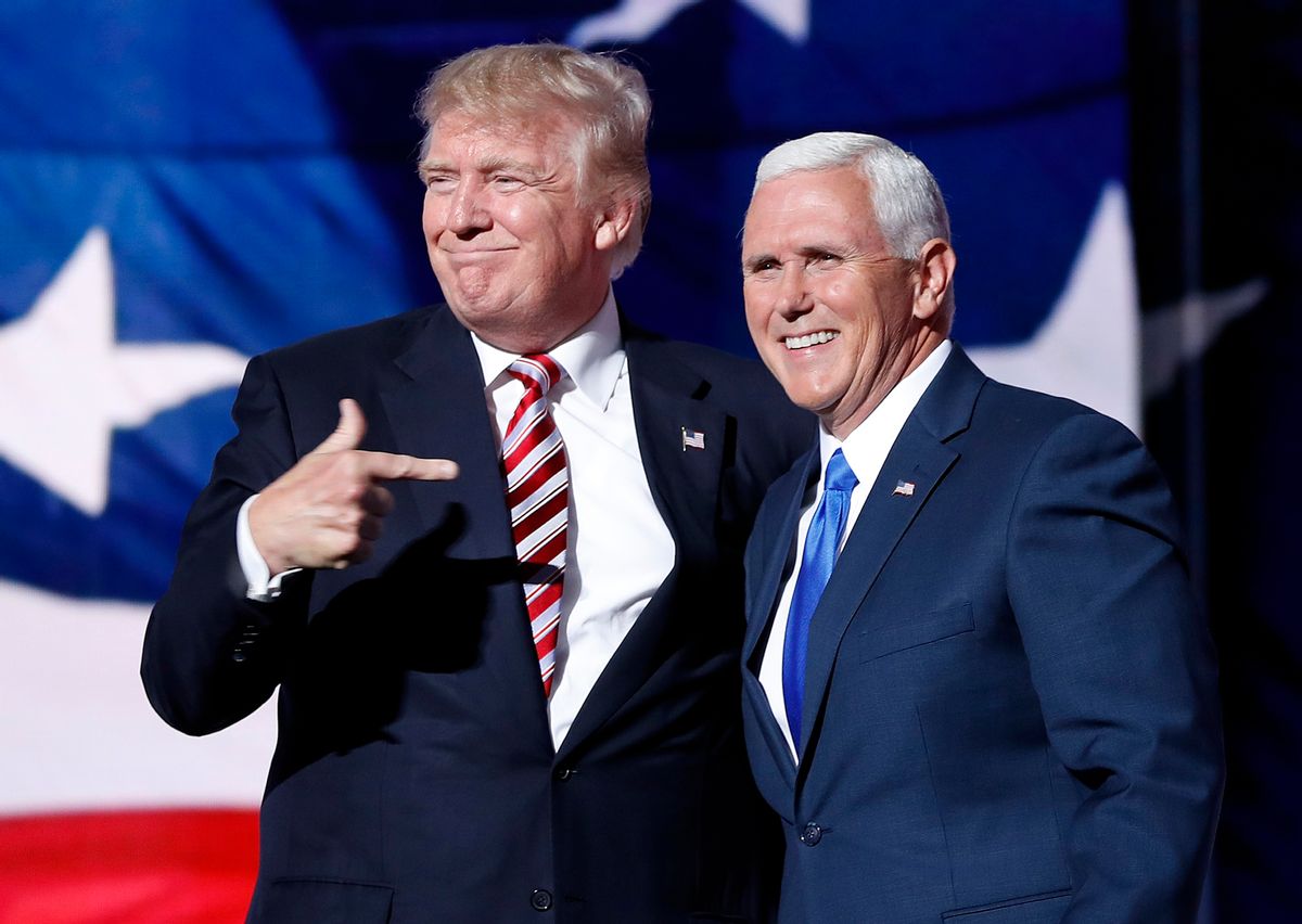 Republican presidential candidate Donald Trump, points toward Republican vice presidential candidate Indiana Gov. Mike Pence after Pence's acceptance speech during the third day session of the Republican National Convention in Cleveland, Wednesday, July 20, 2016. (AP Photo/Mary Altaffer) (AP)