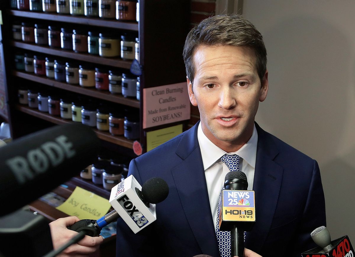 FILE - In this Feb. 6, 2015, file photo, former U.S. Rep. Aaron Schock, R-Ill. speaks to reporters in Peoria, Ill. A federal grand jury that heard evidence on possible spending violations by Schock has been disbanded after its term ended. But legal experts said Wednesday, July 20, 2016 that doesn't necessarily mean the investigation is closed. Another panel could still take up the case. (AP Photo/Seth Perlman, File) (AP)