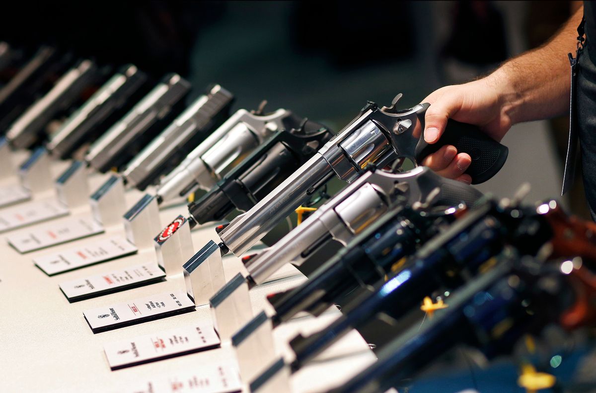 FILE - In this Jan. 19, 2016 file photo, handguns are displayed at the Smith &amp; Wesson booth at the Shooting, Hunting and Outdoor Trade Show in Las Vegas.  (AP)