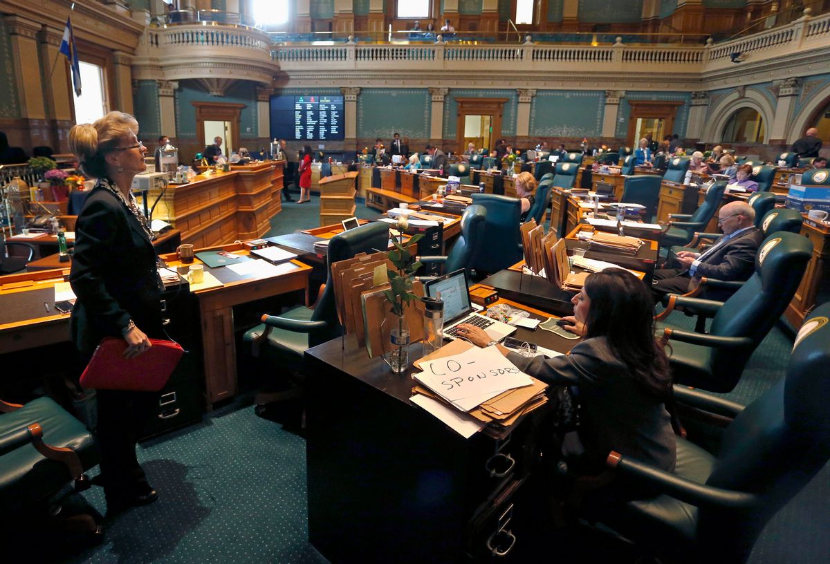 FILE - In this Wednesday May 6, 2015 file photo, legislators wait for a bill to be brought to the floor in the state house on the closing day of the 2015 Colorado legislative session at the Capitol in Denver. Colorado has the highest number of women serving in a state legislature, with 42 percent, but it has never had a woman governor or U.S. senator. (AP Photo/Brennan Linsley) (AP)