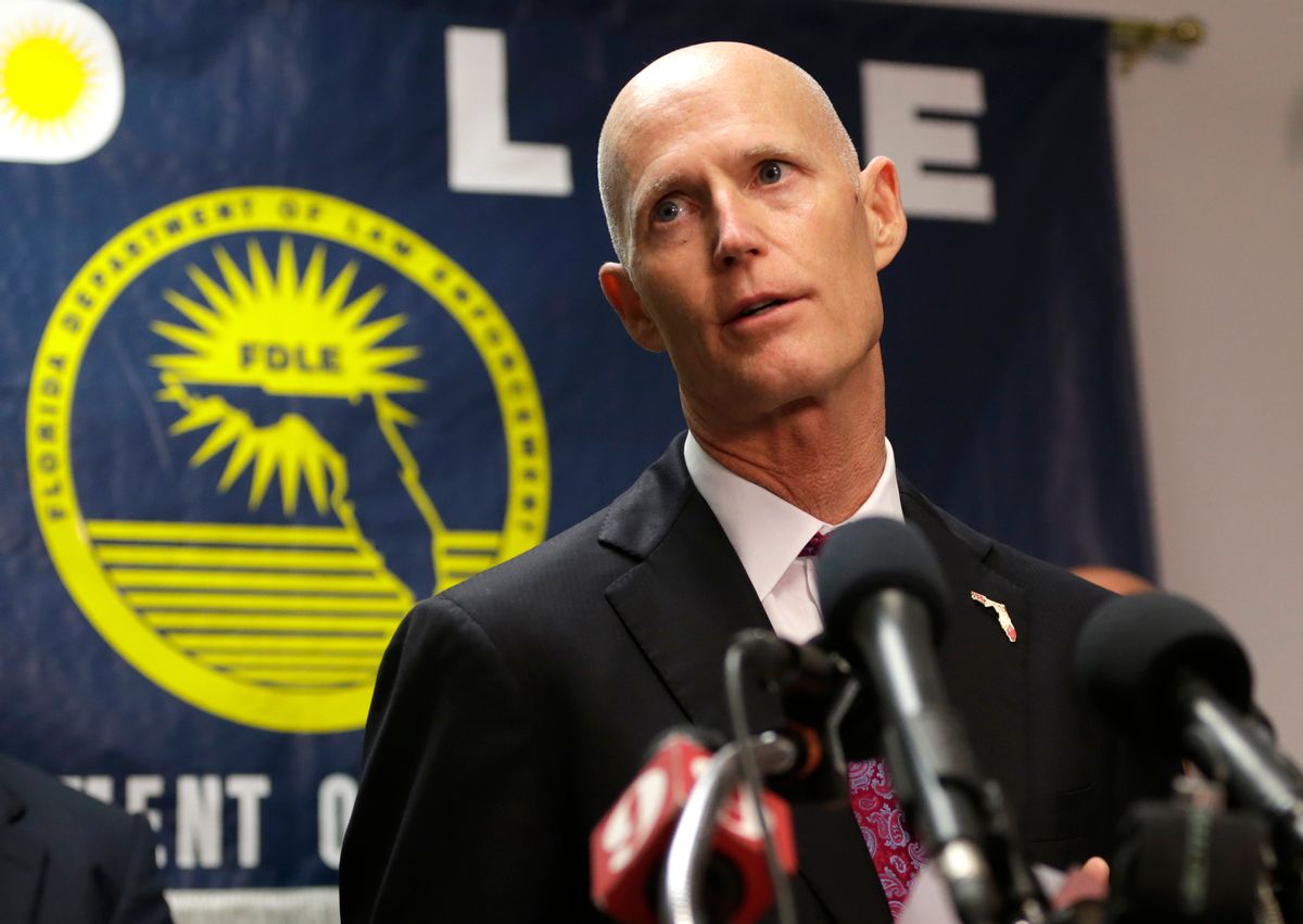 Florida Gov. Rick Scott makes a statement at a news conference in response to a deadly shooting outside the Club Blu nightclub in Fort Myers, Fla., Monday, July 25, 2016. Police said the gunfire, which erupted at a swimsuit-themed party for teens, was not an act of terrorism. (AP Photo/Lynne Sladky) (AP)