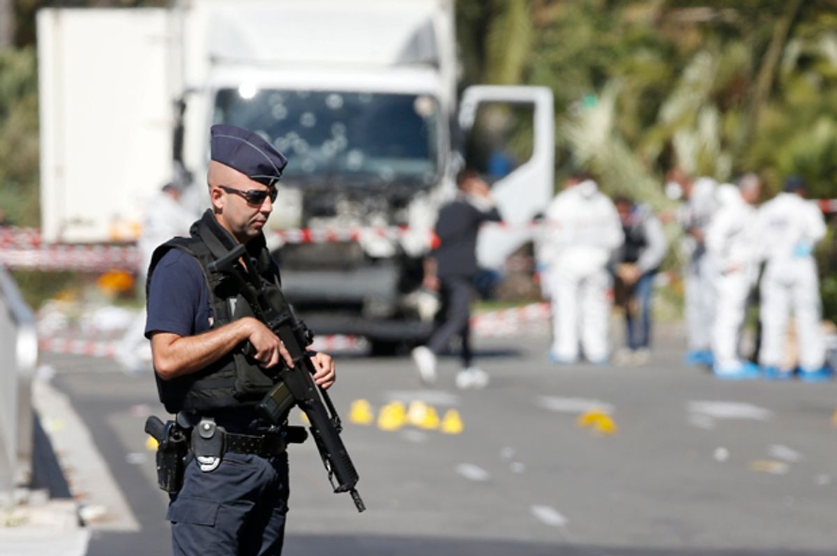 French police secure the area as the investigation continues in Nice, France, July 15, 2016.    (Reuters/Eric Gaillard)
