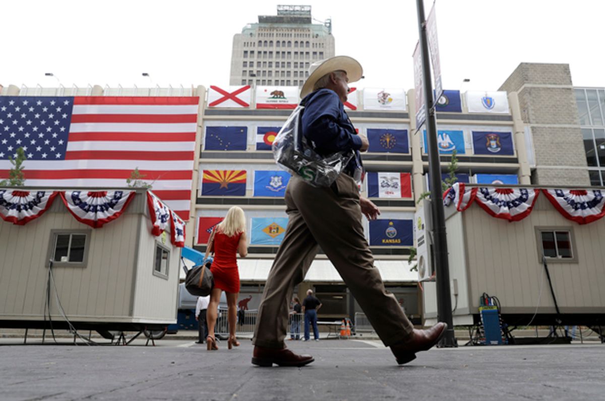 Delegates walk outside of Quicken Loans Arena before the opening session of the Republican National Convention in Cleveland, July 18, 2016.   (AP/Matt Rourke)