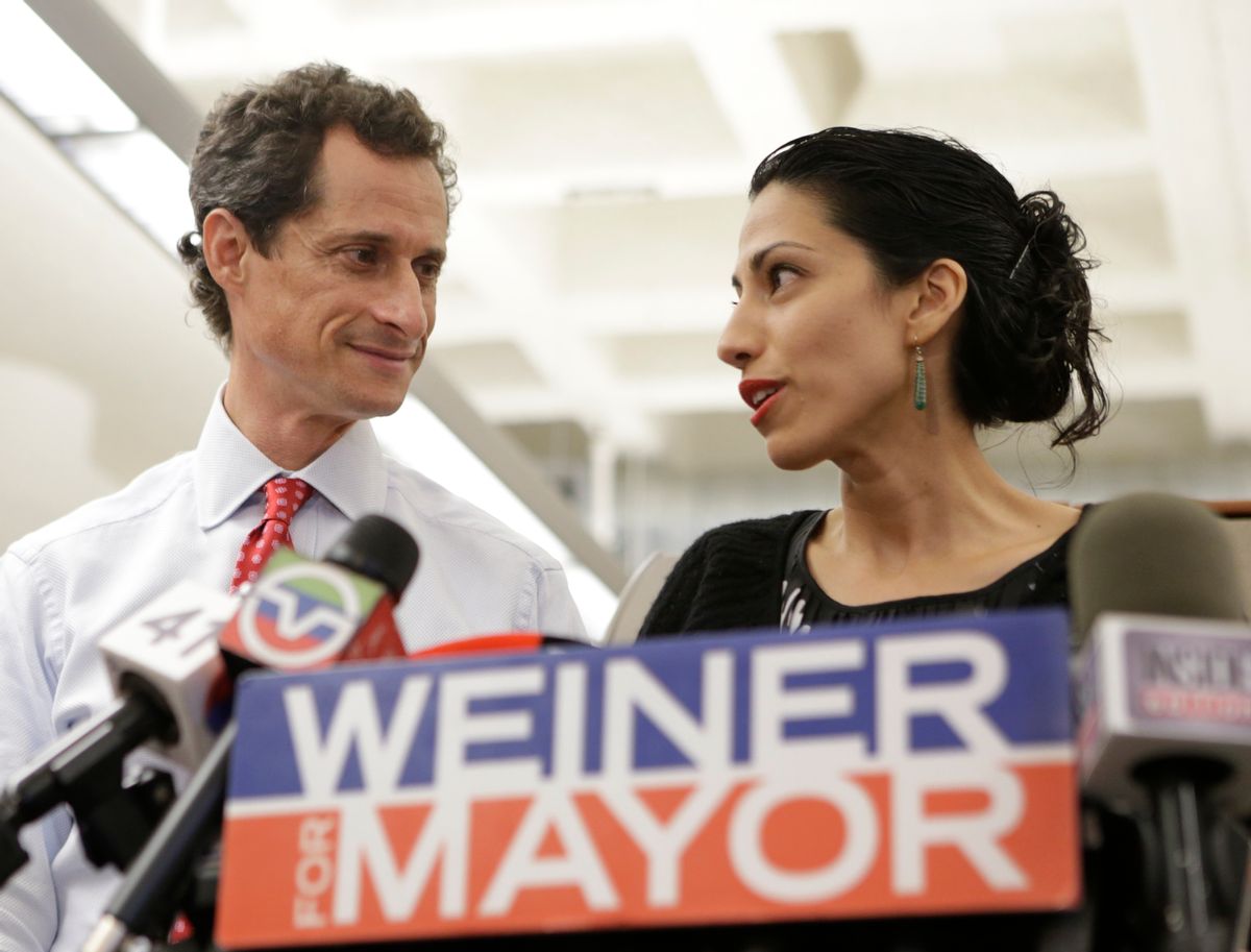 FILE - In this July 23, 2013 file photo, Huma Abedin, alongside her husband, then-New York mayoral candidate Anthony Weiner, speaks during a news conference in New York. Democratic presidential candidate Hillary Clinton aide Huma Abedin says she is separating from husband Anthony Weiner after another sexting revelation involving the former congressman from New York.  (AP Photo/Kathy Willens, File) (AP)