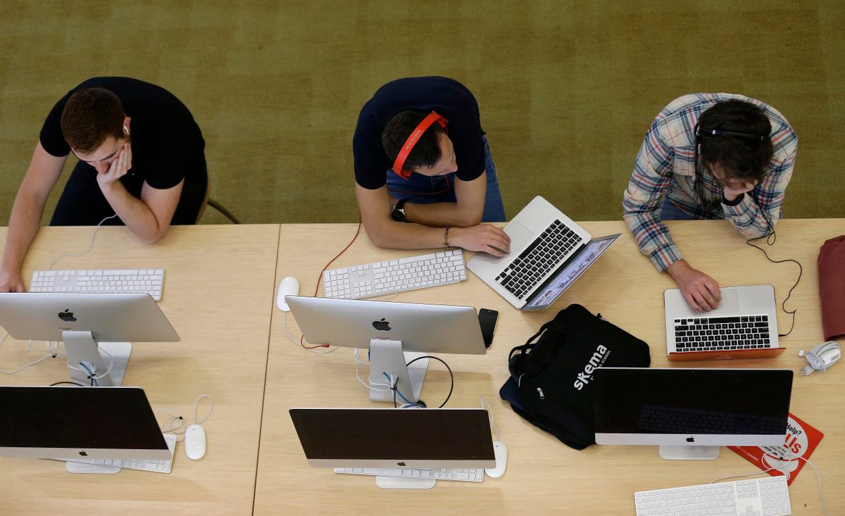Students work on computers at the Hunt Library at North Carolina State University in Raleigh, N.C., on Tuesday, May 3, 2016. Creature comforts and technology have supplemented, not supplanted the learning spaces in renovated libraries. Students can choose from open seating to group study rooms to individual carrels for quiet study. (AP Photo/Gerry Broome) (AP)