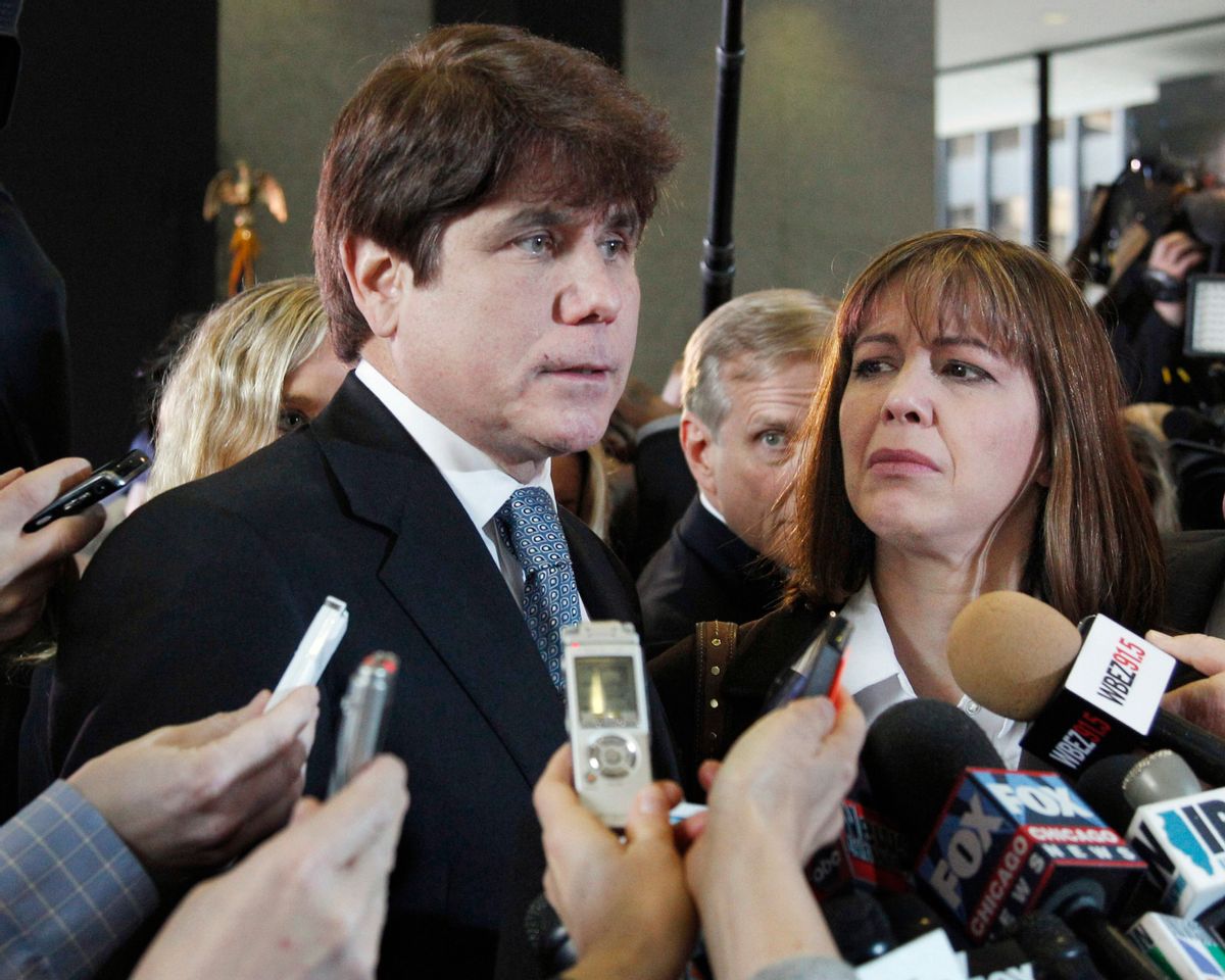 FILE - In this Dec. 7, 2011 file photo, former Illinois Gov. Rod Blagojevich, left, speaks to reporters as his wife, Patti, listens at the federal building in Chicago.A federal judge will decide Tuesday, Aug. 9, 2016, whether to cut the 14-year prison term given to Blagojevich after he was convicted of corruption, including charges that he tried to exchange an appointment to President Barack Obama's old U.S. Senate seat in exchange for campaign donations. (AP Photo/M. Spencer Green, File) (AP)