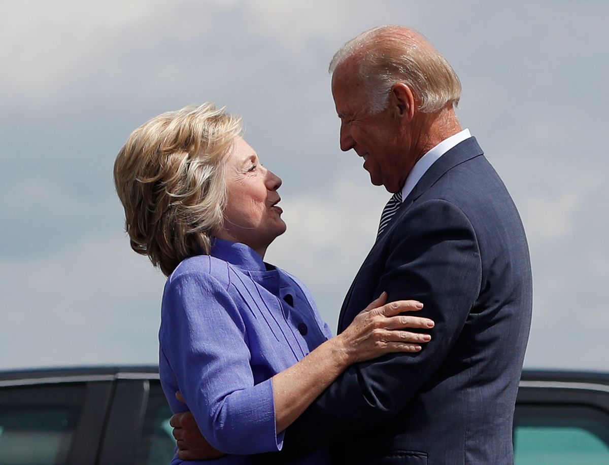 Democratic presidential candidate Hillary Clinton greets Vice President Joe Biden on the tarmac at Wilkes-Barre/Scranton International Airport in Avoca, Pa., Monday, Aug. 15, 2016, before traveling together to a campaign event in Scranton, Pa. (AP Photo/Carolyn Kaster) (AP)