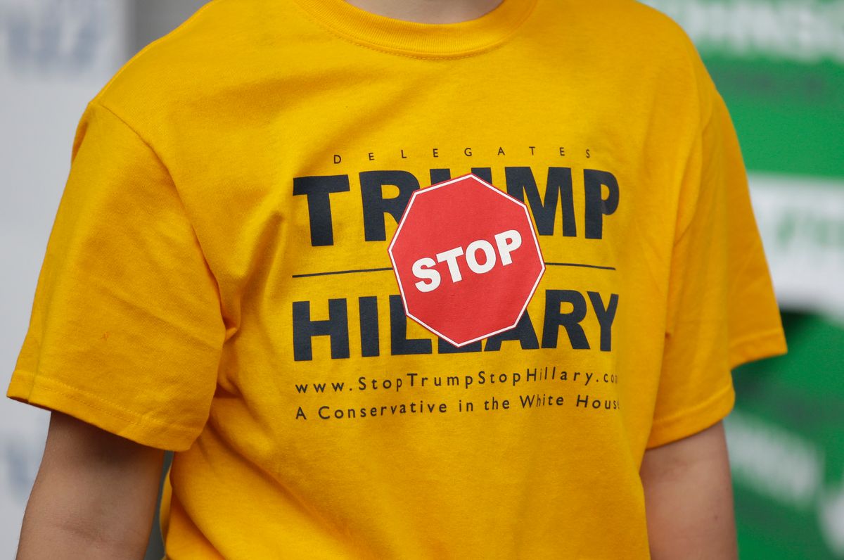 This April 23, 2016, file photo, a person displays their t-shirt outside of the Utah Republican Party 2016 convention, in Salt Lake City. Donald Trump has shattered the normal Republican consensus in Utah even more so than he has nationwide, activating fault lines under a normally stable electorate largely unified by a single religion. (AP Photo/Rick Bowmer, File) (AP)