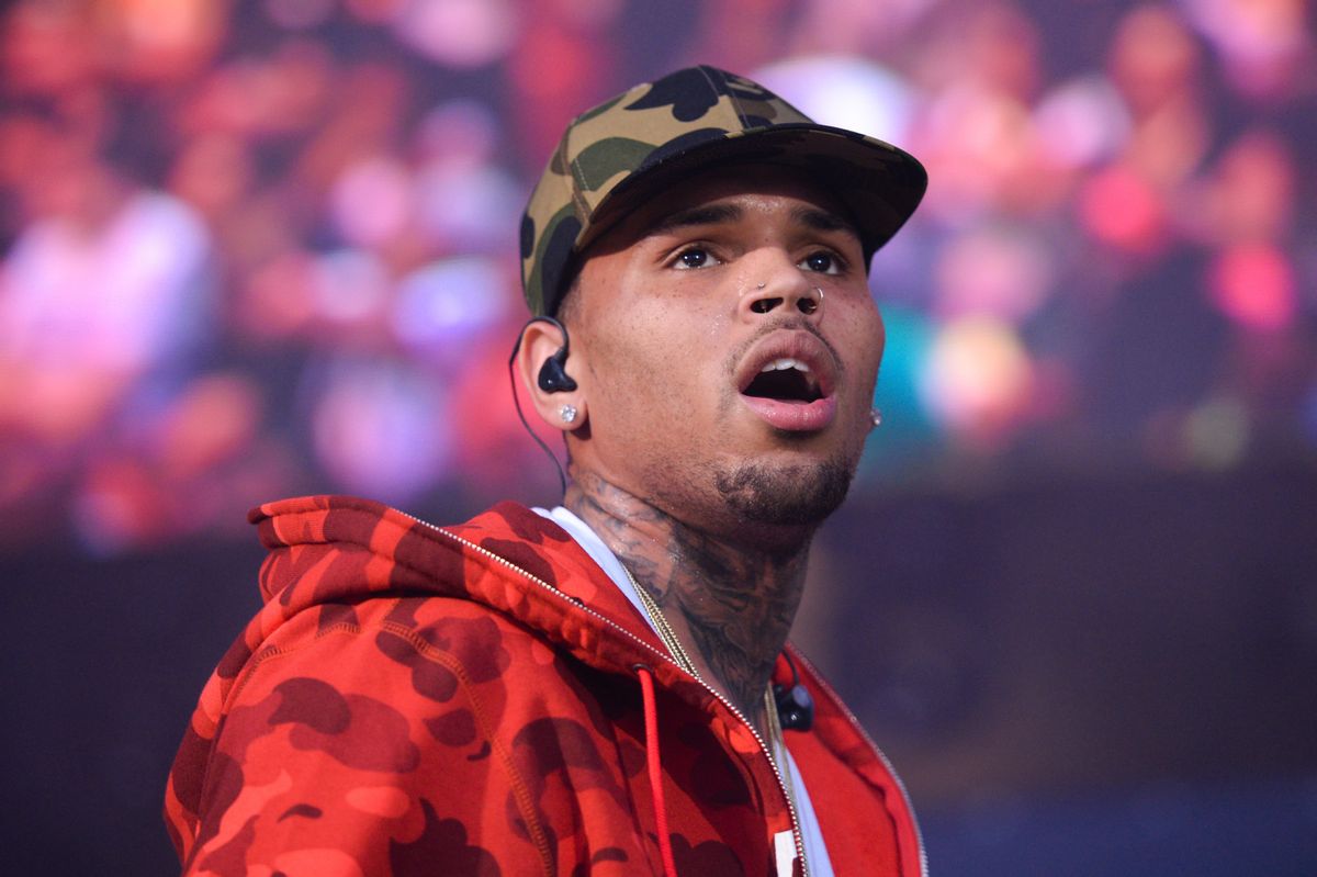FILE - In this June 7, 2015, file photo, rapper Chris Brown performs at the 2015 Hot 97 Summer Jam at MetLife Stadium in East Rutherford, N.J. Authorities said officers responded to singer Brown's Los Angeles home early Tuesday, Aug. 30, 2016, after a woman called police seeking assistance. (Photo by Scott Roth/Invision/AP, File) (AP)