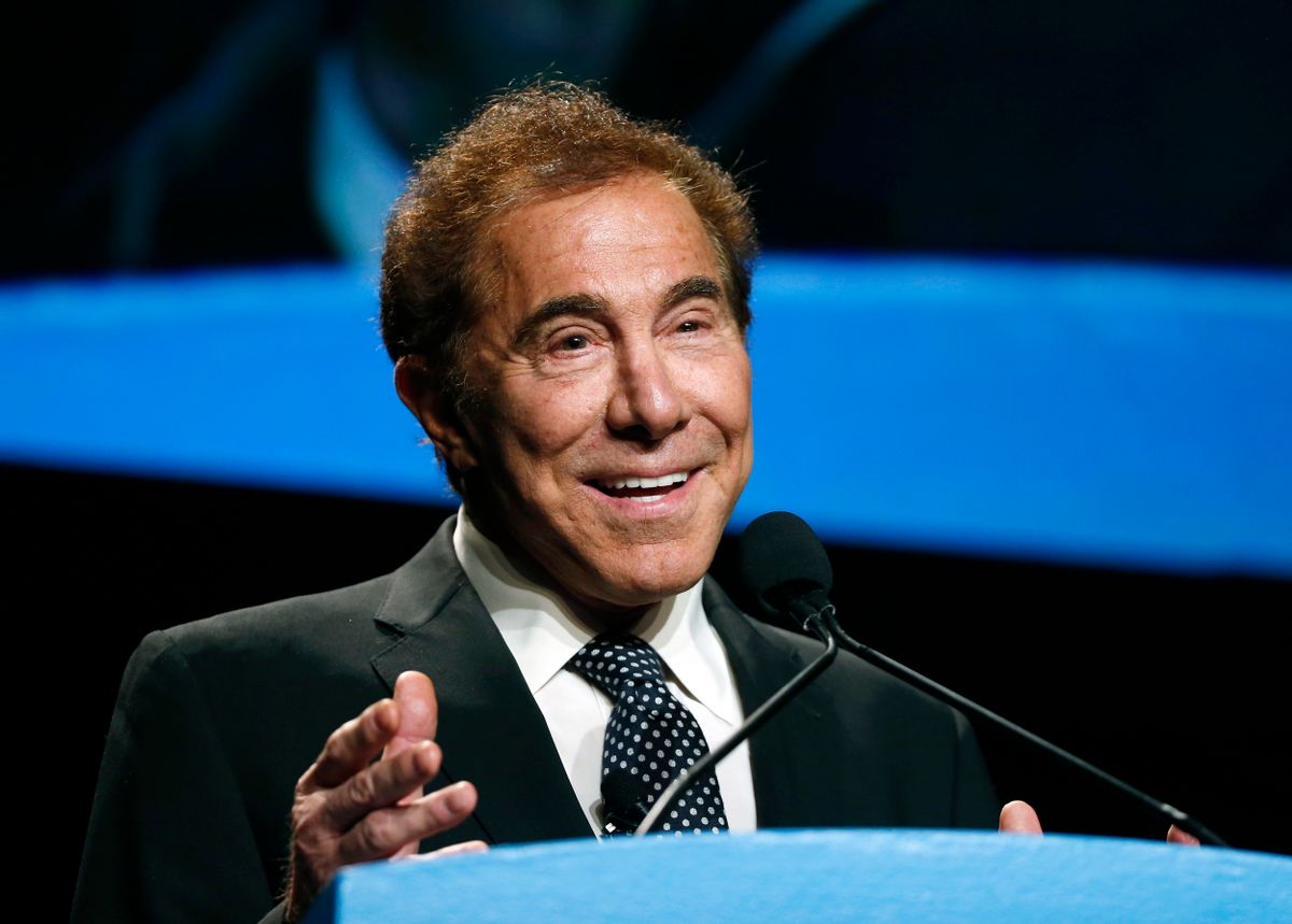 FILE - In this Jan. 15, 2015, file photo, Steve Wynn, CEO of Wynn Resorts, delivers the keynote address at Colliers International Annual Seminar at the Boston Convention Center in Boston. From a pair of giant golden dragons on the edge of a vast man-made lagoon to phoenix and cloud motifs throughout the interior, Wynn’s new multibillion dollar Macau resort brims with auspicious Chinese symbolism. The U.S. casino mogul will be hoping luck is on his side as he prepares to launch his Wynn Palace project in the Asian gambling hub, where growth is downshifting into a new phase after years of turbocharged expansion. (AP Photo/Elise Amendola, File) (AP)