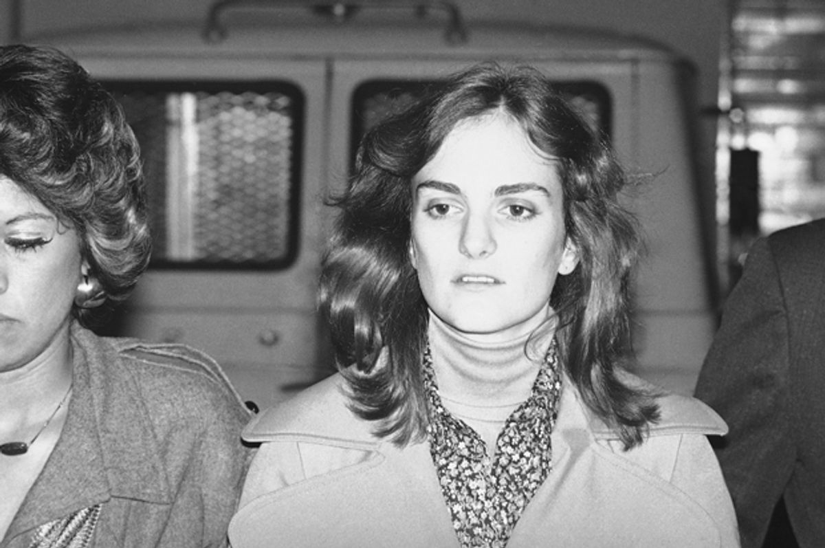Patty Hearst leaves the San Francisco Federal Building, Feb. 13, 1976, during her trial on bank robbery charges.   (AP)