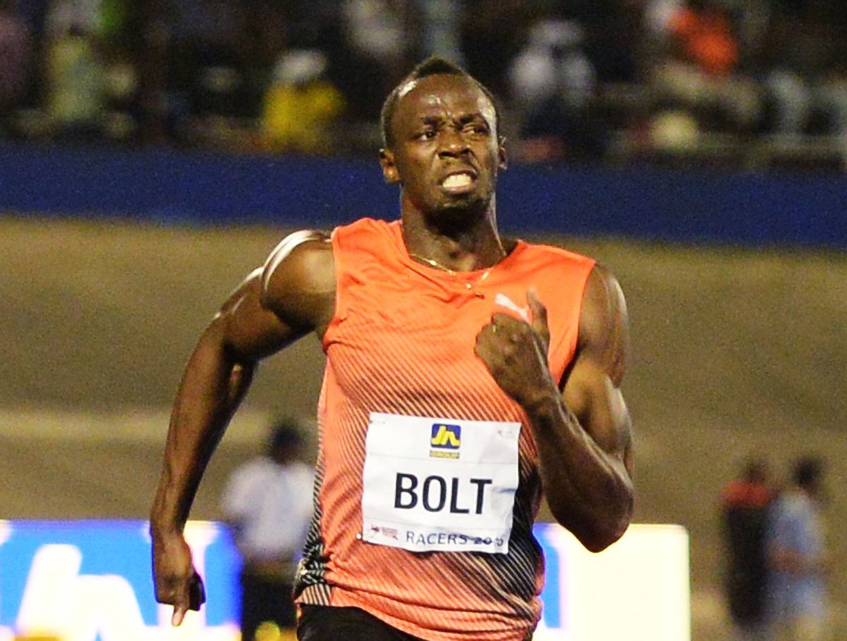 FILE - In this June 11, 2016, file photo, Usain Bolt, of Jamaica, wins the 100-meter final ahead of Yohan Blake and Asafa Powell, both of Jamaica, in the Racers Grand Prix track and field event at the National Stadium in Kingston, Jamaica. We'll finally get our chance to see the fastest man in the world. Bolt, the two-time defending champion in the 100-meter sprint, takes to the track for his first heat of the games Saturday, Aug. 13 . The Jamaican athlete (and self-described entertainer) set the world record in 2009 and the Olympic record in 2012 (London) breaking his previous record set in Beijing in 2008. (AP Photo/Collin Reid, File) (AP)
