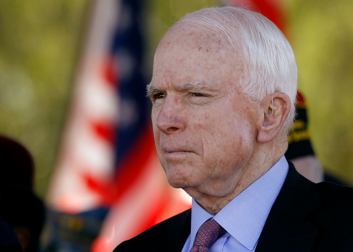 FILE - In this Monday, May 30, 2016, Sen. John McCain, R-Ariz, looks on during a Phoenix Memorial Day Ceremony at the National Memorial Cemetery of Arizona in Phoenix. Eight years after stumping across the nation as the Republican Party's presidential candidate, McCain is back on the campaign trail in his home state as he faces a primary challenge and a strong Democratic opponent in the general election. (AP Photo/Ralph Freso, File) (AP)