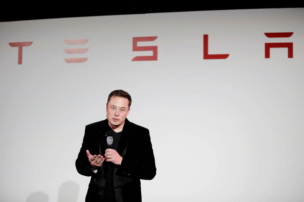 FILE - In a Sept. 29, 2015 file photo, Elon Musk, CEO of Tesla Motors Inc., talks about the Model X car at the company's headquarters, in Fremont, Calif. On Monday, Aug. 1, 2016, Tesla and SolarCity announced they have entered into an agreement under which Tesla will acquire SolarCity. Tesla will pay approximately $2.6 billion for solar panel maker SolarCity in an all-stock deal. (AP Photo/Marcio Jose Sanchez, File) (AP)