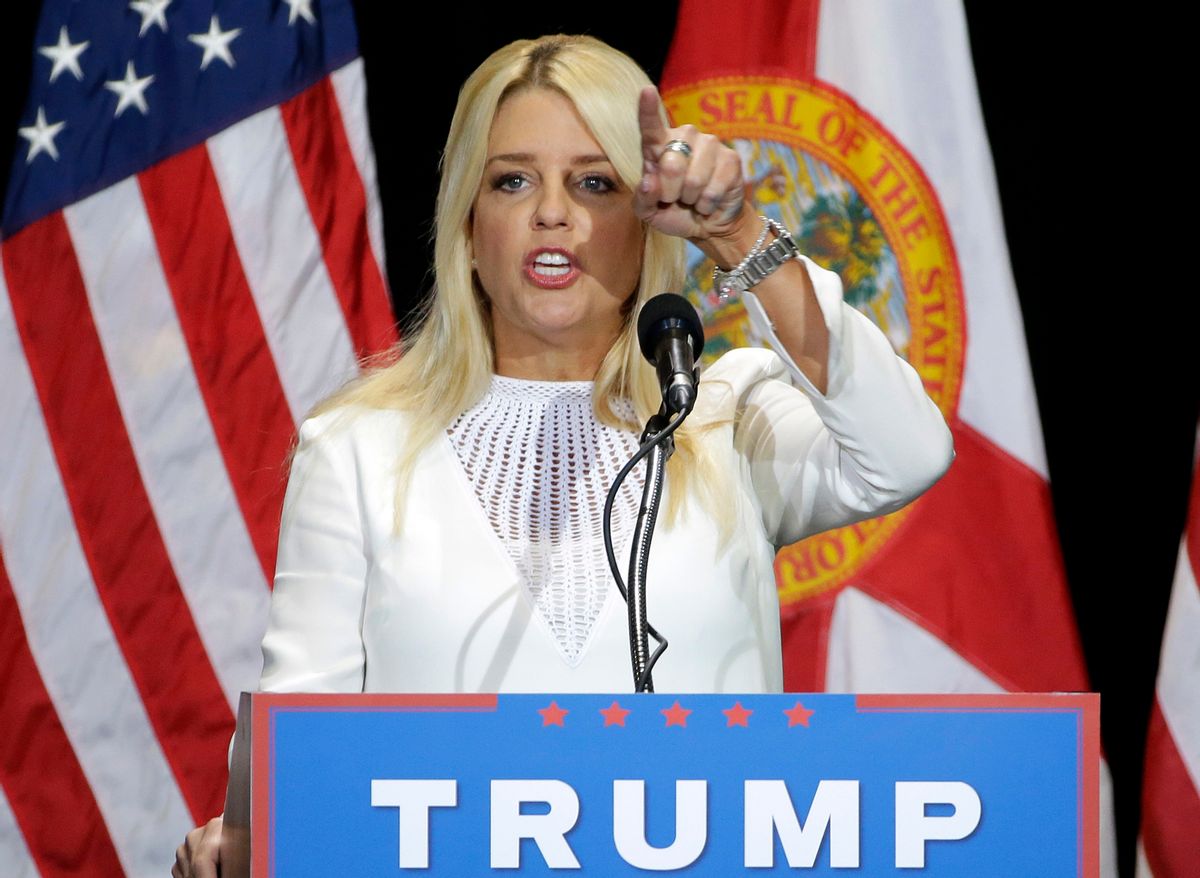 Florida Attorney General Pam Bondi gestures as he speaks to supporters of Republican presidential candidate Donald Trump during a rally Saturday, June 11, 2016, in Tampa, Fla. (AP Photo/Chris O'Meara) (AP)
