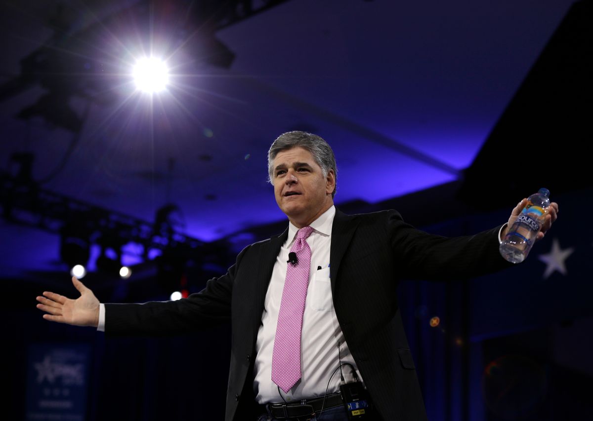 FILE - In this March 4, 2016, file photo, Sean Hannity of Fox News arrives in National Harbor, Md. Fox News told Politico on Tuesday, Sept. 20, 2016, that Hannity won’t be appearing in any more campaign videos for Republican presidential nominee Donald Trump. Hannity touted Trump in a brief segment of an 8-minute long video posted on the candidate's YouTube channel Sunday, Sept. 18, 2016. (AP Photo/Carolyn Kaster, File)