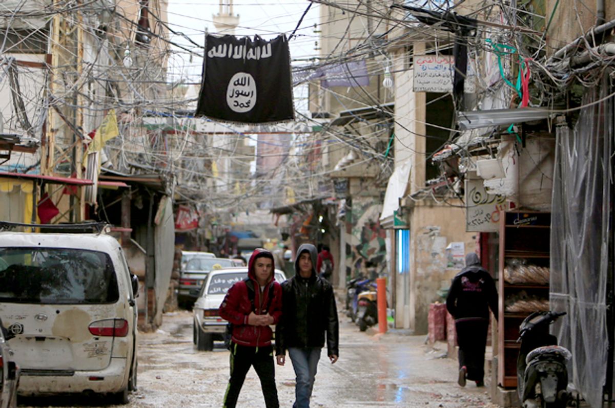 An Islamic State flag hangs in Ain al-Hilweh Palestinian refugee camp, near Sidon,  (Reuters/Ali Hashisho)