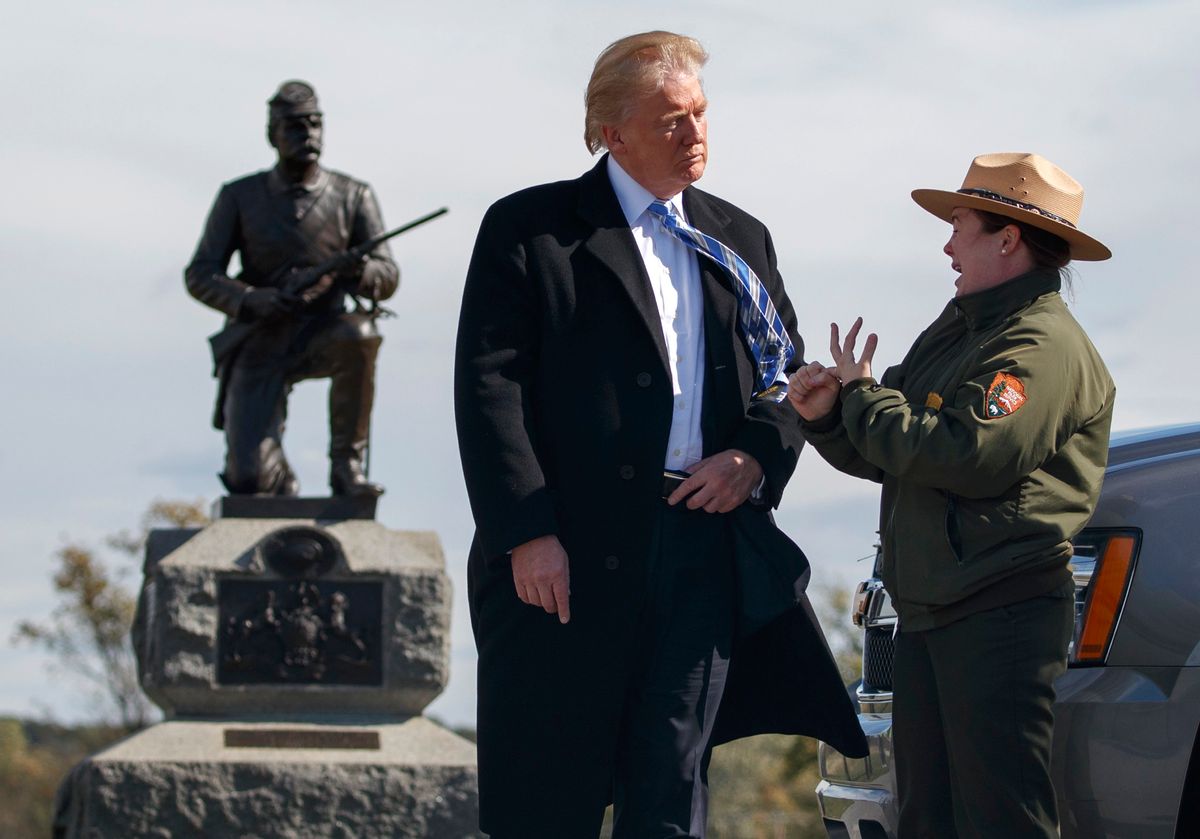 Interpretive park ranger Caitlin Kostic speaks to Republican presidential candidate Donald Trump as she gives him a tour at Gettysburg National Military Park Saturday, Oct. 22, 2016, in Gettysburg, Pa.  (AP)