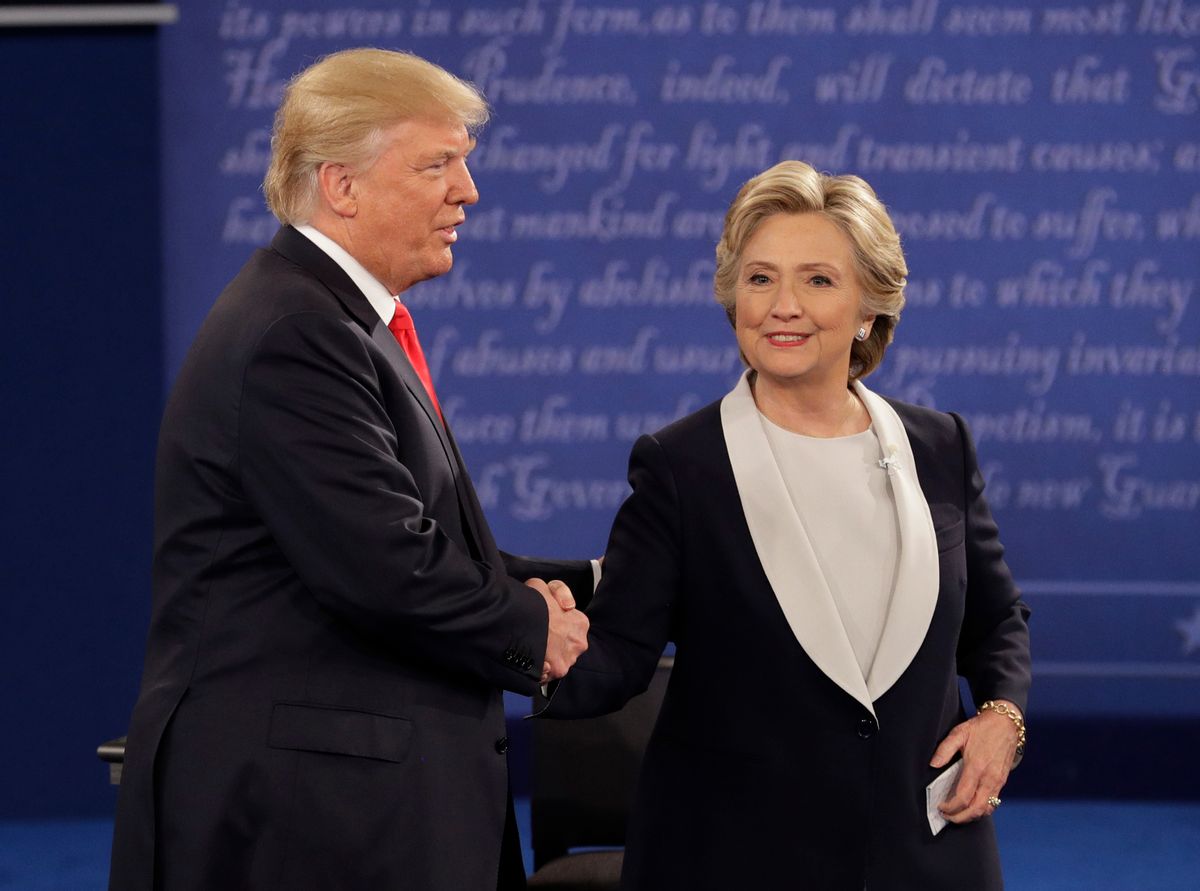 Republican presidential nominee Donald Trump shakes hands with Democratic presidential nominee Hillary Clinton during the second presidential debate at Washington University in St. Louis, Sunday, Oct. 9, 2016. (AP Photo/John Locher) (AP)