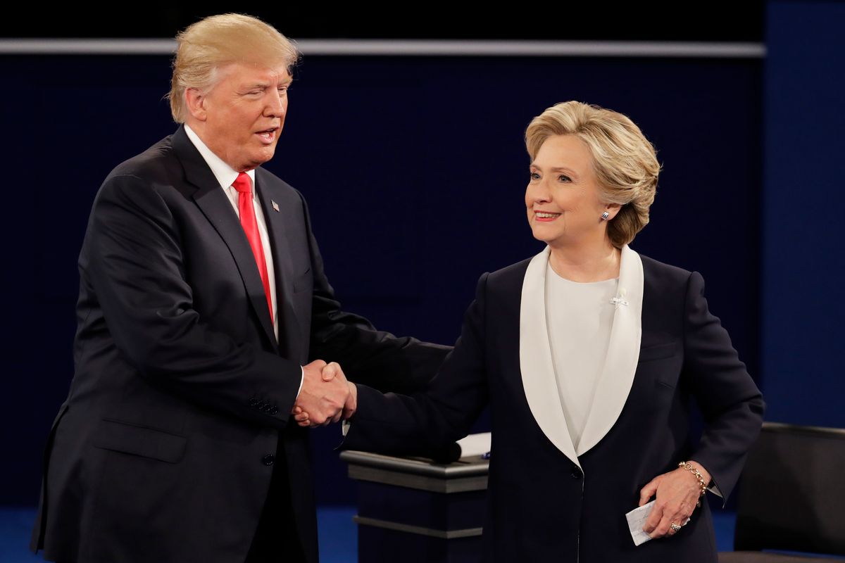 Republican presidential nominee Donald Trump and Democratic presidential nominee Hillary Clinton shake hands after the second presidential debate at Washington University in St. Louis, Sunday, Oct. 9, 2016.  (AP)