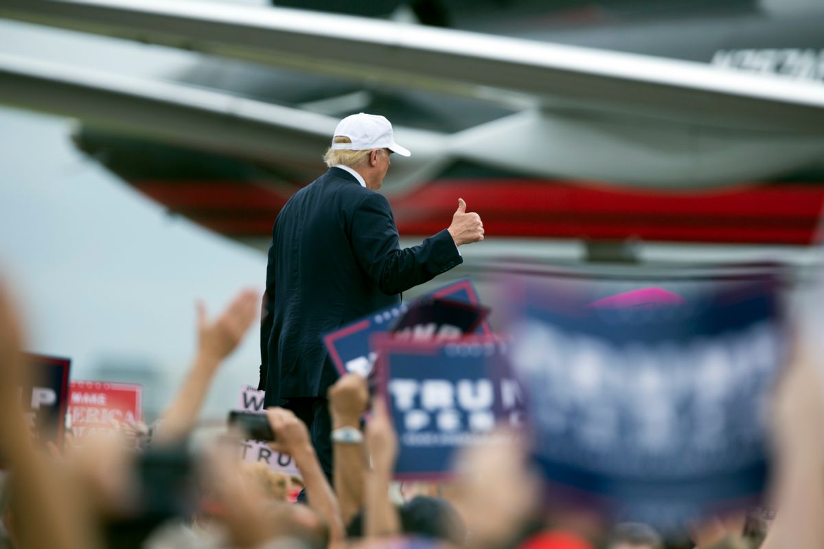 Republican presidential candidate Donald Trump walks to his plane after speaking during a campaign rally, Wednesday, Oct. 12, 2016, in Lakeland, Fla. (AP Photo/ Evan Vucci) (AP)